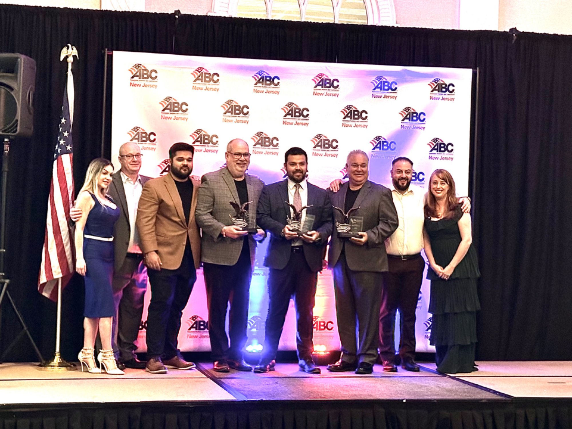 Imperial Construction & Electric team accepting three Eagle Awards at the 2025 ABC New Jersey Excellence in Construction Awards